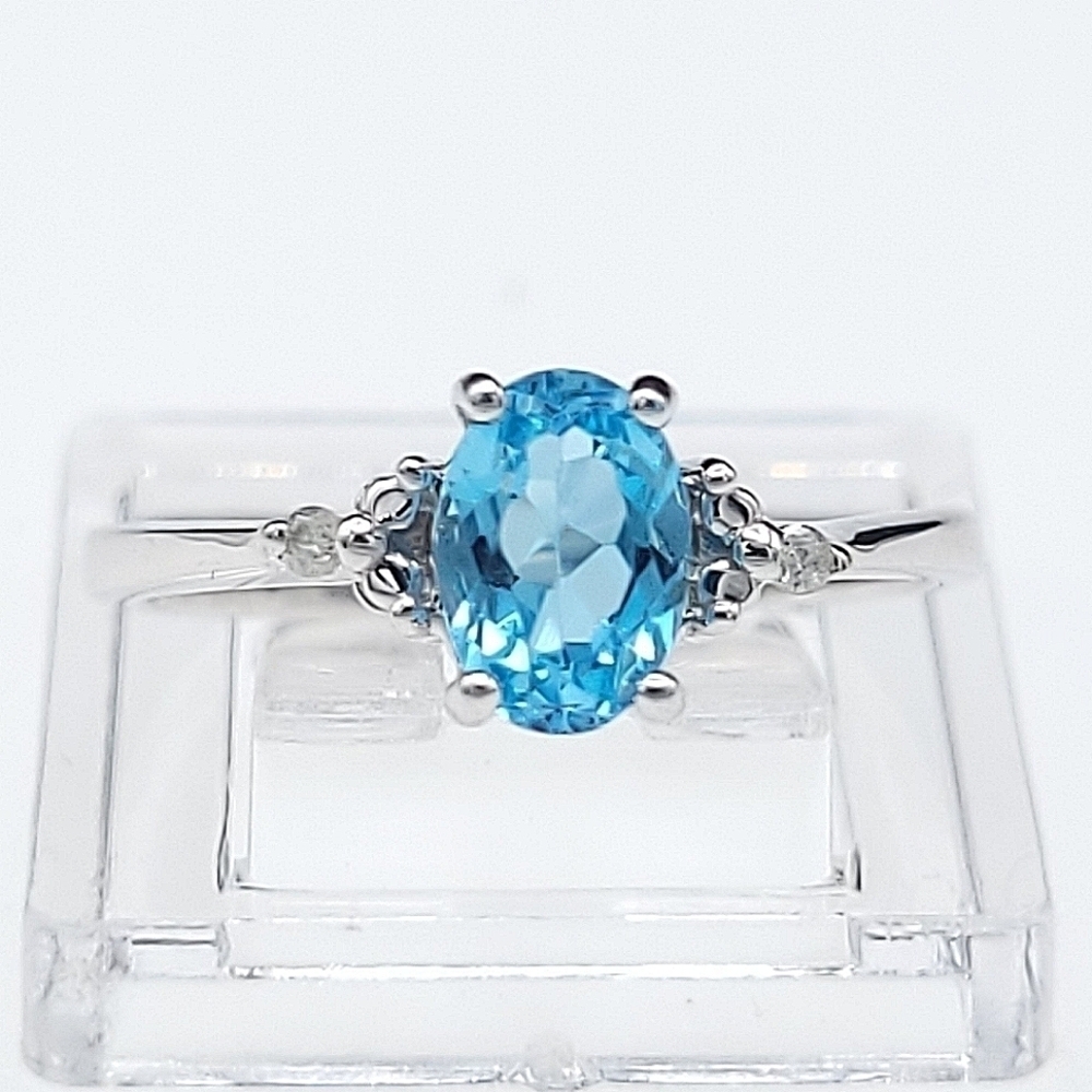 10k white gold blue topaz and diamond ring